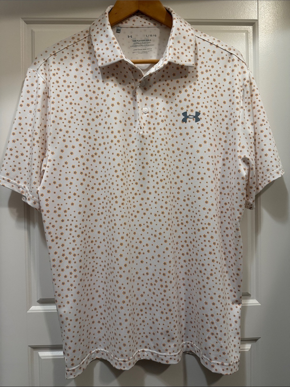 Under Armour White Polo with Small Orange Star Print
